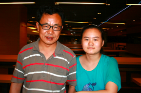 Zhang Lin and his 11-year old daughter, Anni