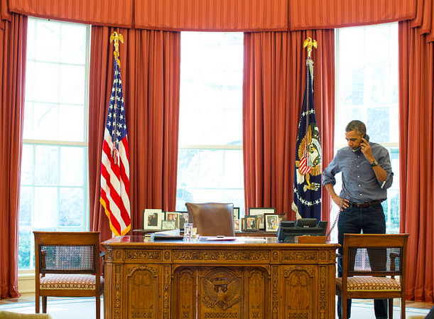 President Barack Obama talks on the phone in the Oval Office with Russian President Vladimir Putin about the situation in Ukraine, March 1, 2014. (Official White House Photo by Pete Souza)