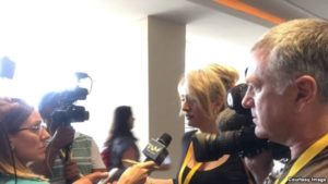 TV Marti reporter Karen Caballero talking to reporters after being ejecting from press conference by Cuban officials